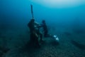 September 10, 2020. Anapa, Russia. Professional freediver in wetsuit with mono fin underwater in sea. Freediving in Black sea