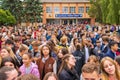 September 23, 2022 Beltsy Moldova. Illustrative editorial background. Crowd of schoolchildren leaving school