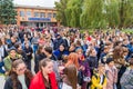 September 23, 2022 Beltsy Moldova. Illustrative editorial background. Crowd of schoolchildren leaving school