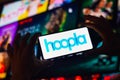 September 2, 2022, Brazil. In this photo illustration, the Hoopla logo is displayed on a smartphone screen Royalty Free Stock Photo