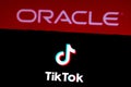 September 21, 2020, Brazil. In this photo illustration a TikTok logo is seen displayed on a smartphone with an Oracle logo on the Royalty Free Stock Photo