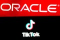 September 21, 2020, Brazil. In this photo illustration a TikTok logo is seen displayed on a smartphone with an Oracle logo on the Royalty Free Stock Photo