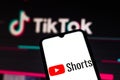 September 21, 2020, Brazil. In this photo illustration a YouTube Shorts logo is seen displayed on a smartphone with an TikTok logo Royalty Free Stock Photo