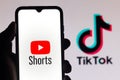 September 21, 2020, Brazil. In this photo illustration a YouTube Shorts logo is seen displayed on a smartphone with an TikTok logo Royalty Free Stock Photo
