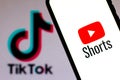 September 21, 2020, Brazil. In this photo illustration a YouTube Shorts logo is seen displayed on a smartphone with an TikTok logo Royalty Free Stock Photo