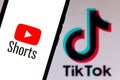 September 21, 2020, Brazil. In this photo illustration a YouTube Shorts logo is seen displayed on a smartphone with an TikTok logo Royalty Free Stock Photo