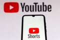 September 21, 2020, Brazil. In this photo illustration a YouTube Shorts logo is seen displayed on a smartphone with an YouTube Royalty Free Stock Photo