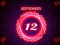 12 september calendar, neon text on bricks background