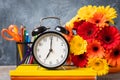 1 September concept postcard, teachers` day, back to school or college, supplies, alarm clock Royalty Free Stock Photo