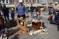 Clog maker selling wooden shoes in Delft.