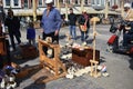 Clog maker selling wooden shoes in Delft.