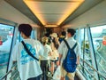 September 2, 2023. Denpasar, Bali, Indonesia. The passengers are queuing at the boarding gate to board the airplane.