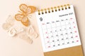 A September 2023 desk calendar for the organizer to plan and reminder and butterfly paer on yellow background Royalty Free Stock Photo