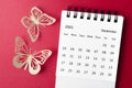 A September 2023 desk calendar for the organizer to plan and reminder with paer butterfly on red background