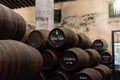 September 3, 2019, El Puerto de Santa Maria, Andalusia, Spain, old bodega with dark wooden barrels with sherry wine Royalty Free Stock Photo