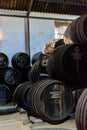 September 3, 2019, El Puerto de Santa Maria, Andalusia, Spain, old bodega with dark wooden barrels with sherry wine Royalty Free Stock Photo