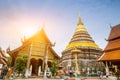 The enormous pagoda and golden Buddhist temple of Lanna art in Wat Phra That Lampang Luang