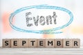 September event sign with blue sketch