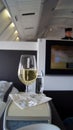 SEPTEMBER 2014: First Class Dining onboard an Boeing 747, white wine and water