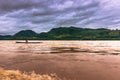 September 21, 2014: Fisherman in the Mekong river, Laos Royalty Free Stock Photo