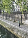 Fisherman catches tiny Seine fish, Paris