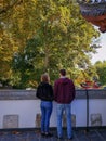 Young Caucasian couple enjoying the view on the traditional Chinese garden in the wildlife park Pairi Daiza