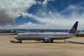 Huge vehicle pushing back a airplane United Airlines in airport Houston TX USA Royalty Free Stock Photo