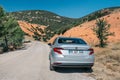 Fiat Egea car parked on a dirt road in a forest in the Taurus mountains