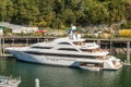 September 14, 2018 - Juneau, Alaska: Sleek white Luxury yacht docked in harbor.