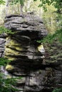 September in Karkonosze, a rock hanging over a mountain stream