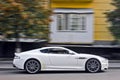 September 2017, Kiev - Ukraine; White Aston Martin DBS. Supercar. Car in motion Royalty Free Stock Photo