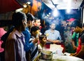 September, 2017,Kolkata,India. Customers buying egg roll at a stall in kolkata at night.