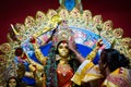 September, 2017,Kolkata,India.Durga Baran Ritual.Married ladies greeting durga idol with sweet and betel leaves during dashami puj