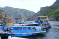 September 20 2023 - Lake Koman, Albania: people and cars waiting at the Ferry pier for crossing the lake Royalty Free Stock Photo