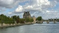 The Louvre viewed from across the Seine on a September day, Paris