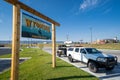 Welcome to Wyoming state border crossing sign, with a truck in the photo