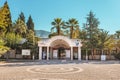 Entry gate of the ancient pool with thermal springs and remains of columns is a popular