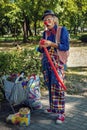 5 September, Plovdiv, Bulgaria. Adult clown entertains kids with balloons and making party in the park in summer day