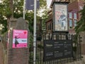Posters at Moco Museum advertising Banksy and Dali exhibits