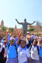 September 29 2022 - Pretoria, South Africa: Happy Children at the Nelson Mandela statue on his square in front of Union Buildings Royalty Free Stock Photo