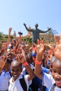 September 29 2022 - Pretoria, South Africa: Happy Children at the Nelson Mandela statue on his square in front of Union Buildings Royalty Free Stock Photo