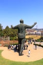 September 29 2022 - Pretoria, South Africa: People around the Nelson Mandela statue on his square in front of Union Buildings in Royalty Free Stock Photo