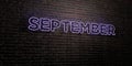 SEPTEMBER -Realistic Neon Sign on Brick Wall background - 3D rendered royalty free stock image