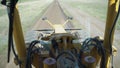 View from the cab of a LiuGong 425-4WD CLG grader during operation