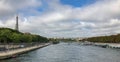 The Seine on a September Sunday, crowds and Eiffel Tower in back