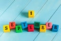 1 September sign on color wooden cubes with light Royalty Free Stock Photo