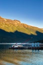 September 15, 2018 - Skagway, AK: Broadway Dock with tugboat and crane at sunrise.