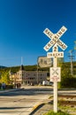 September 15, 2018 - Skagway, AK: Railway tracks crossing near Dewey Creek on Congress Way. Royalty Free Stock Photo