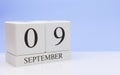 September 09st. Day 9 of month, daily calendar on white table with reflection, with light blue background. Autumn time, empty Royalty Free Stock Photo