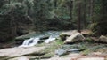 September in the Sudety Mountains, a cascade on a stream Royalty Free Stock Photo